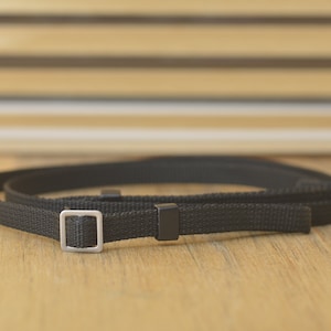 Black Camera Strap. A lovely addition to your vintage set up.