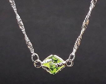 Er kwam zoveel ongeluk uit voort; er kan alleen maar geluk zijn." - kryptoniet-meteoorsteen Swarovski STERLING-zilveren ketting