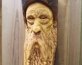 Contemplating Viking wood spirit. Viking Jarl, bizerker, Northman. Hand carved wood spirit. Wall or fence mounted, stagarden or indoor.