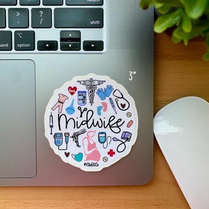 May include: A 3-inch round sticker with a white background and a variety of colorful illustrations related to midwifery. The text "Midwife" is written in a stylized font. The sticker is on a silver laptop.