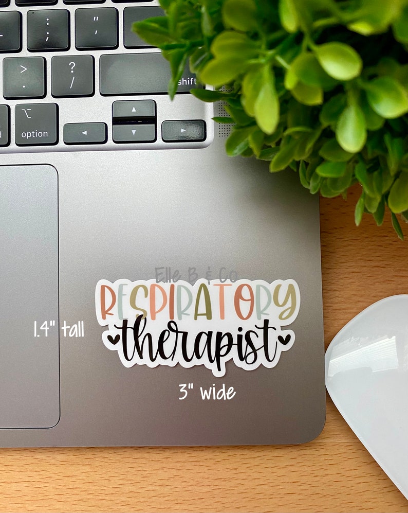 May include: A sticker with the text "RESPIRATORY therapist" in colorful letters with a heart on each side of the word "therapist". The sticker is on a silver laptop with a white mouse next to it. The sticker is 1.4 inches tall and 3 inches wide.