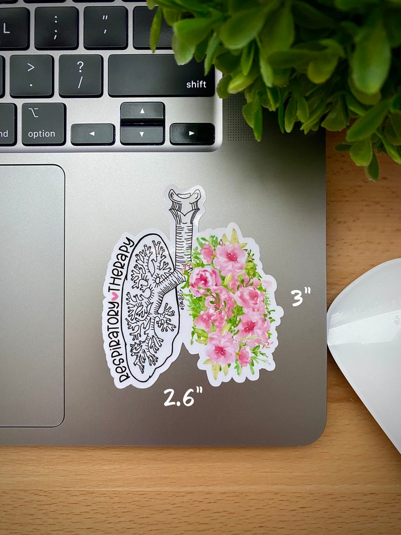 May include: A white sticker with a black line drawing of a lung with pink watercolor flowers. The sticker says "Respiratory Therapy" with a heart symbol. The sticker is 2.6 inches by 3 inches.