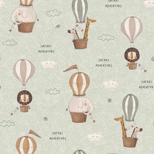 Cotton fabric cotton fabric exotic animals safari elephant giraffe lion zebra balloon hot air balloon clouds dots light green from 50 cm
