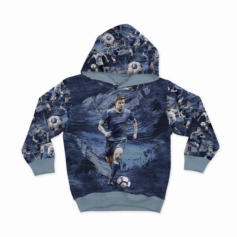 May include: A blue hooded sweatshirt with a repeating pattern of a soccer player dribbling a ball. The pattern is on a blue and white abstract background.