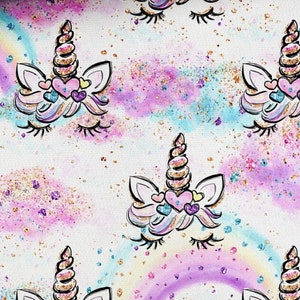 May include: A white background with a repeating pattern of unicorn faces with gold glitter horns and eyelashes. The unicorns have pink, blue, and purple watercolour accents and hearts around their eyes.