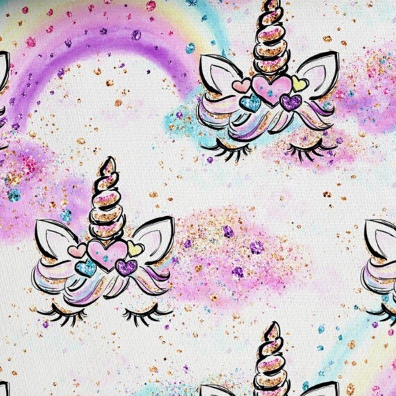 May include: A white background with a repeating pattern of unicorn faces with pink, purple, and blue watercolour accents. The unicorns have gold horns and are surrounded by gold glitter.