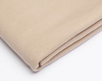 Tyg UNI manschett lätt ribbad beige latte 115 cm extra brett rör x 25 cm