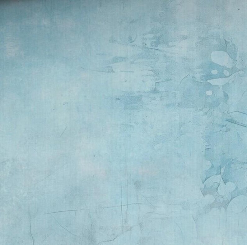 May include: A textured, light blue background with subtle variations in tone and visible brushstrokes. The surface has a distressed appearance, with darker blue patches and fine lines adding depth and visual interest. The overall effect is a soft, muted aesthetic.