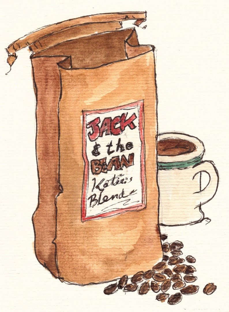 May include: A brown paper bag with the text "Jack & the Bean Katie's Blend" on a red label. A white coffee cup with brown coffee inside is next to the bag. There are brown coffee beans scattered on the white background.