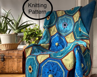 PDF-breipatroon alleen in het Engels. Bloemrijk Afghaans. Veelkleurig breiwerk. Gebreide achthoekige en vierkante motieven samengevoegd met haakwerk.