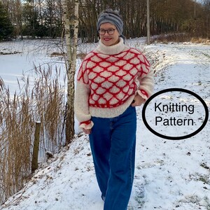 May include: A woman wearing a white and red knitted sweater with a geometric pattern, gray beanie, and blue jeans walks on a snowy path. The text "Knitting Pattern" is written in a circle in the lower right corner of the image.