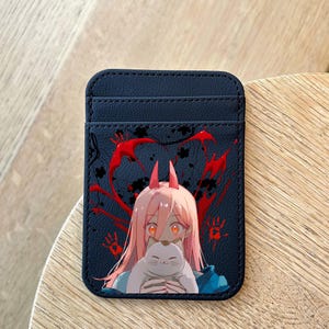 Tarjetero de piel de Anime Devil Girl: billetera delgada con adorable dibujo de una gatita, estampado de anime con detalles en rojo intenso, tarjetero de piel vibrante.
