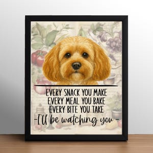 May include: Framed print featuring a golden-brown Cavapoo dog illustration. The print includes the text: "Every snack you make, every meal you bake, every bite you take - I'll be watching you." The background has a vintage botanical design.
