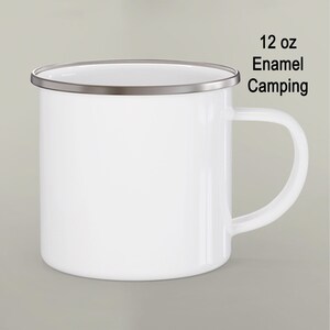 a white coffee mug with a silver rim