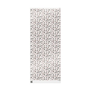 a white wall with a bunch of small dots on it