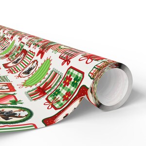 A roll of wrapping paper with a repeating pattern of Christmas-themed designs, including various shapes, patterns, and colors such as red, green, and white.