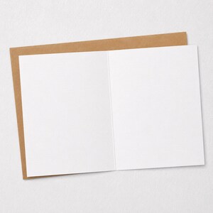 a blank card and an envelope, both placed on a white background.