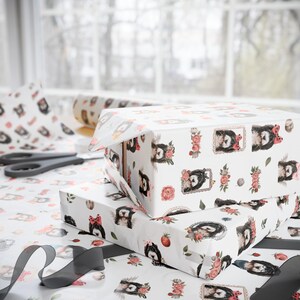 a couple of wrapped presents sitting on top of a table
