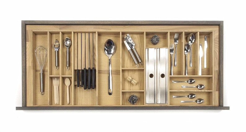 Kitchen organization products are what help make a kitchen more efficient. If you can't find what you need quickly, everything takes longer! Get a more efficient kitchen with these organization products you'll find on Etsy. This custom silverware organizer works like a dream! 