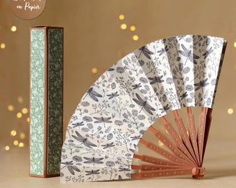 May include: A 3D SVG paper folding fan with a white background featuring a black dragonfly and floral pattern, paired with a matching rectangular box. The fan has brown structural ribs and is designed for use with Cricut, Scanncut, and Cameo machines.