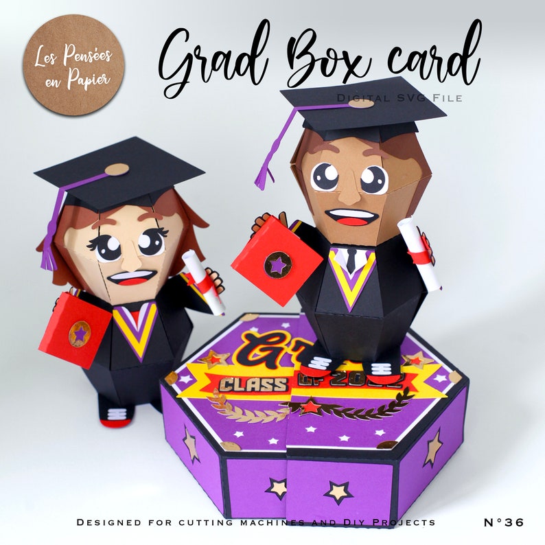 May include: A digital SVG file for a graduation box card. The card features two cartoon graduates, one male and one female, holding diplomas and books. The box is purple with gold accents and the text "Grad Box card" and "Class of 2023".