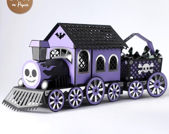 Puede incluir: Un tren de papel 3D SVG en morado y negro con una cara de calavera en la parte delantera, un techo con recortes y un vagón de carga con un diseño de calavera y tibias cruzadas. El tren incluye el texto "Cricut, Scanncut, Cameo... 3D SVG" y "Designed for cutting machines and DIY projects."