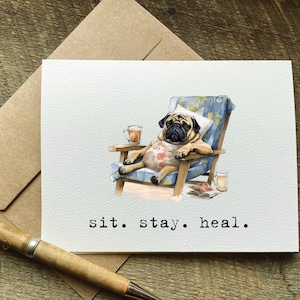 May include: A greeting card with a watercolor illustration of a pug dog relaxing in a lounge chair with a cup of tea. The text on the card reads "sit. stay. heal."