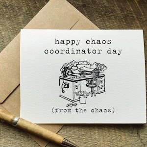 May include: A white card with black text that reads "happy chaos coordinator day (from the chaos)". A black and white illustration of a desk with papers piled high on top of it.