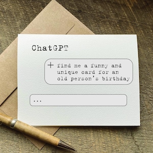 May include: A white greeting card with the word "ChatGPT" at the top. The card includes a text box with the prompt "find me a funny and unique card for an old person's birthday." A pen and envelope are also in the image.