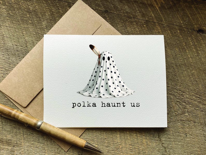 cute halloween greeting card with a play on words that says "polka haunt us" and features a polka dot ghost with a feather