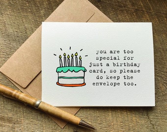 May include: A white greeting card featuring a hand-drawn illustration of a birthday cake with five lit candles and the black text: you are too special for just a birthday card, so please do keep the envelope too. A brown envelope is underneath.