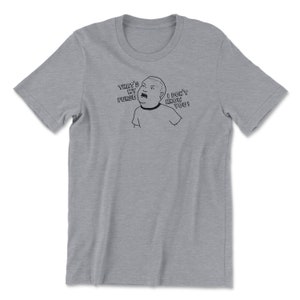 May include: A heather grey t-shirt with a black and white cartoon image of a person saying "That's my purse! I don't know you!"