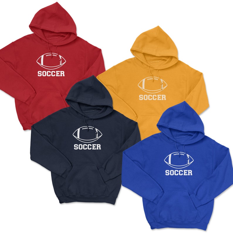 May include: Four hooded sweatshirts in red, gold, navy, and blue. Each sweatshirt features a white football graphic and the word "SOCCER" printed below. The sweatshirts have a front pocket and a hood.