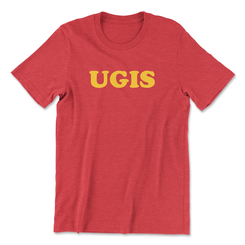May include: Red t-shirt with the word "UGIS" printed in yellow.