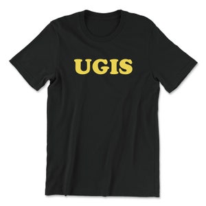May include: Black t-shirt with the word "UGIS" printed in yellow.