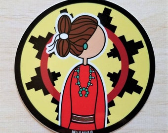 May include: A round sticker with a yellow background and a black and red geometric pattern. In the center is a cartoon illustration of a woman with brown hair, wearing a red dress, turquoise jewelry, and a turquoise earring. The text "HELLO NAVAJO" is at the bottom of the sticker.