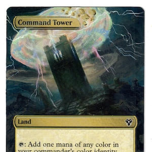 May include: A Magic: The Gathering card depicting a tall, dark tower with a swirling, colorful cloud above it. The card text reads "Command Tower" and "Land". The card's ability is to add one mana of any color in your commander's color identity.