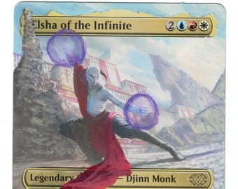 May include: A fantasy trading card featuring a blue, white, and red creature with purple energy orbs. The card is titled "Elsha of the Infinite" and has the text "Legendary Creature - Djinn Monk". The card has a power and toughness of 3/3.