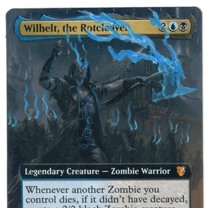 May include: A Magic: The Gathering card featuring Wilhelt, the Rotcleaver, a legendary zombie warrior creature with blue and black accents. The card text reads: "Whenever another Zombie you control dies, if it didn't have decayed, create a 2/2 black Zombie creature token with decayed. At the beginning of your end step, you may sacrifice a Zombie. If you do, draw a card."