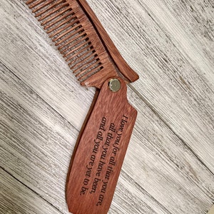 May include: A wooden comb with a folding handle. The handle has an engraved message: "I love you for all that you are, all that you have been, and all you are yet to be."