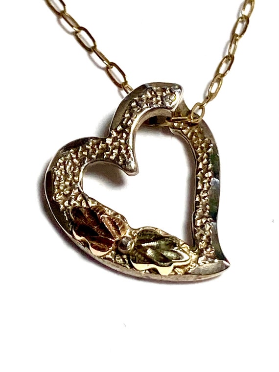 12k solid gold & sterling tri-color heart pendant.