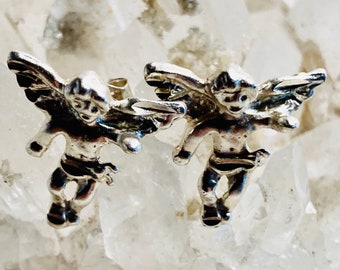 Sterling angel earrings. Sterling silver pierced stud earrings. Marked 925. New. Cute jewelry earrings. Gift for her. Gift.