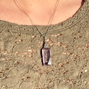 Antique Art Deco blue topaz paste pendant necklace. Emerald cut blue topaz glass paste