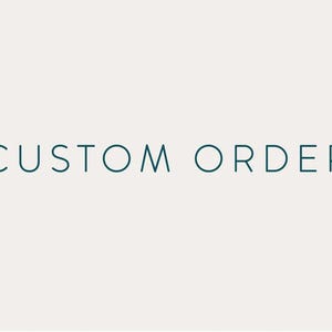 May include: The words "CUSTOM ORDER" are displayed in a teal-coloured, sans-serif font against a cream-coloured background. The text is centred and evenly spaced, creating a clean and simple design.