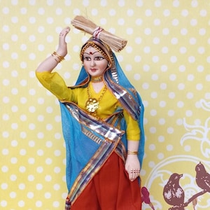 Vintage handcrafted Indian woman in traditional dress