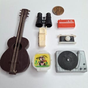 Vintage Barbie radio, record player, camera, cell phone, television, guitar and binoculars