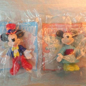 Vintage McDonalds Disney Mickey  Mouse and Minnie Mouse Happy Meal toys Epcot center Adventure collection Mickey and Friends