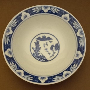 Vintage porcelain blue and white Asian bowl mid century