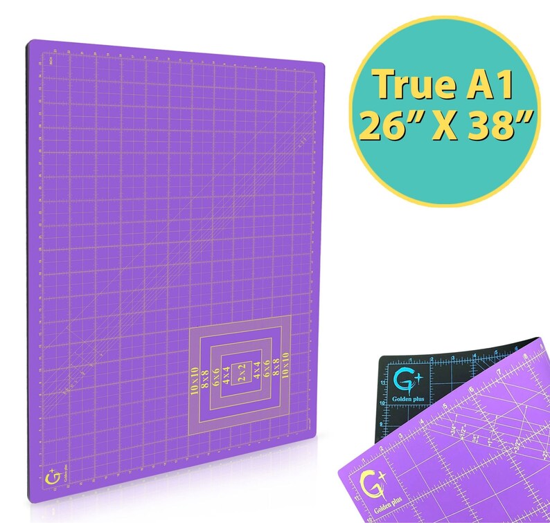 May include: A purple self-healing cutting mat with a grid pattern and measurements in inches. The mat is labeled "True A1 26" x 38"".
