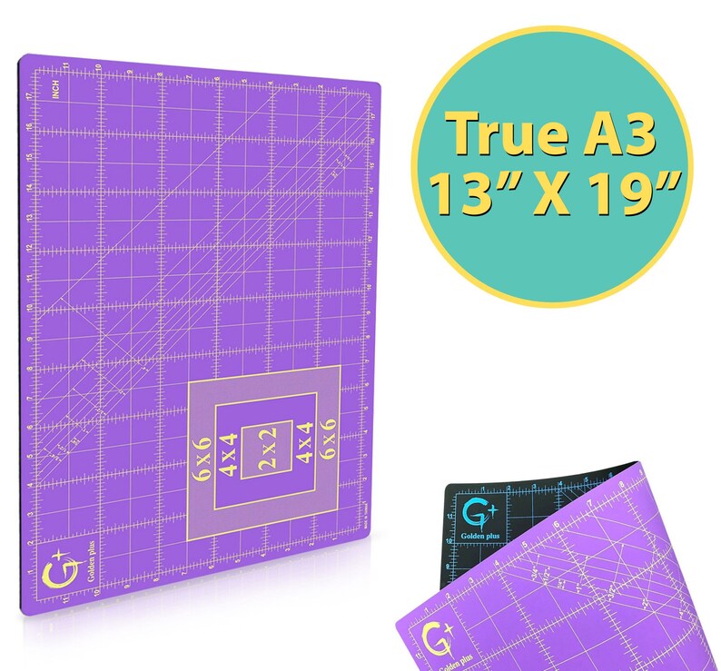 May include: Purple self-healing cutting mat with a grid pattern and measurements in inches. The mat has a black border and a white G+ Golden Plus logo. The mat is labeled "True A3 13" x 19"".